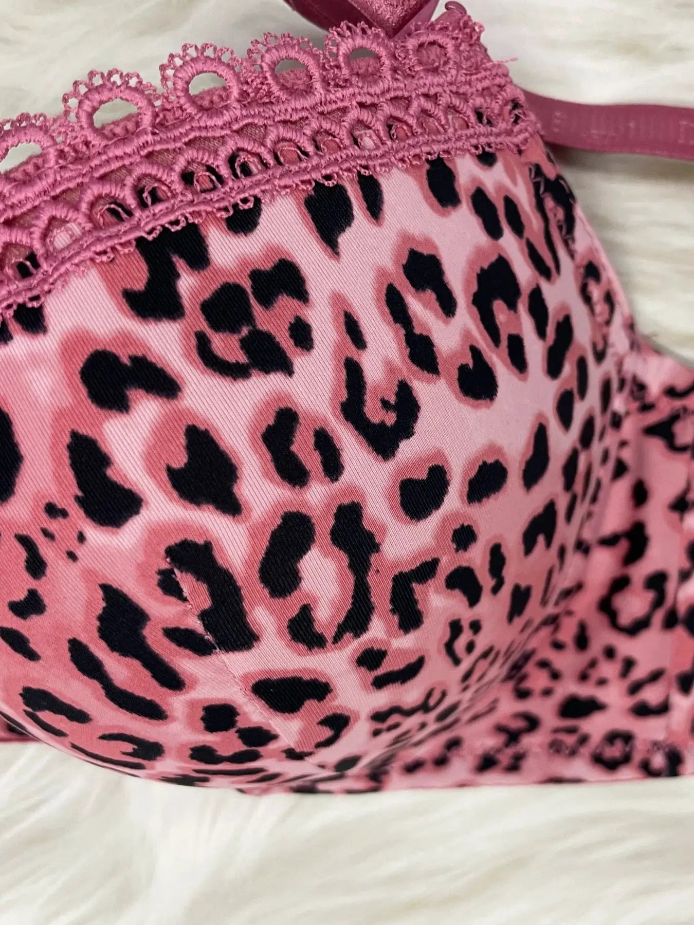 Pink leopard-print push-up bra with pink lace trim and underwire, B cup.
