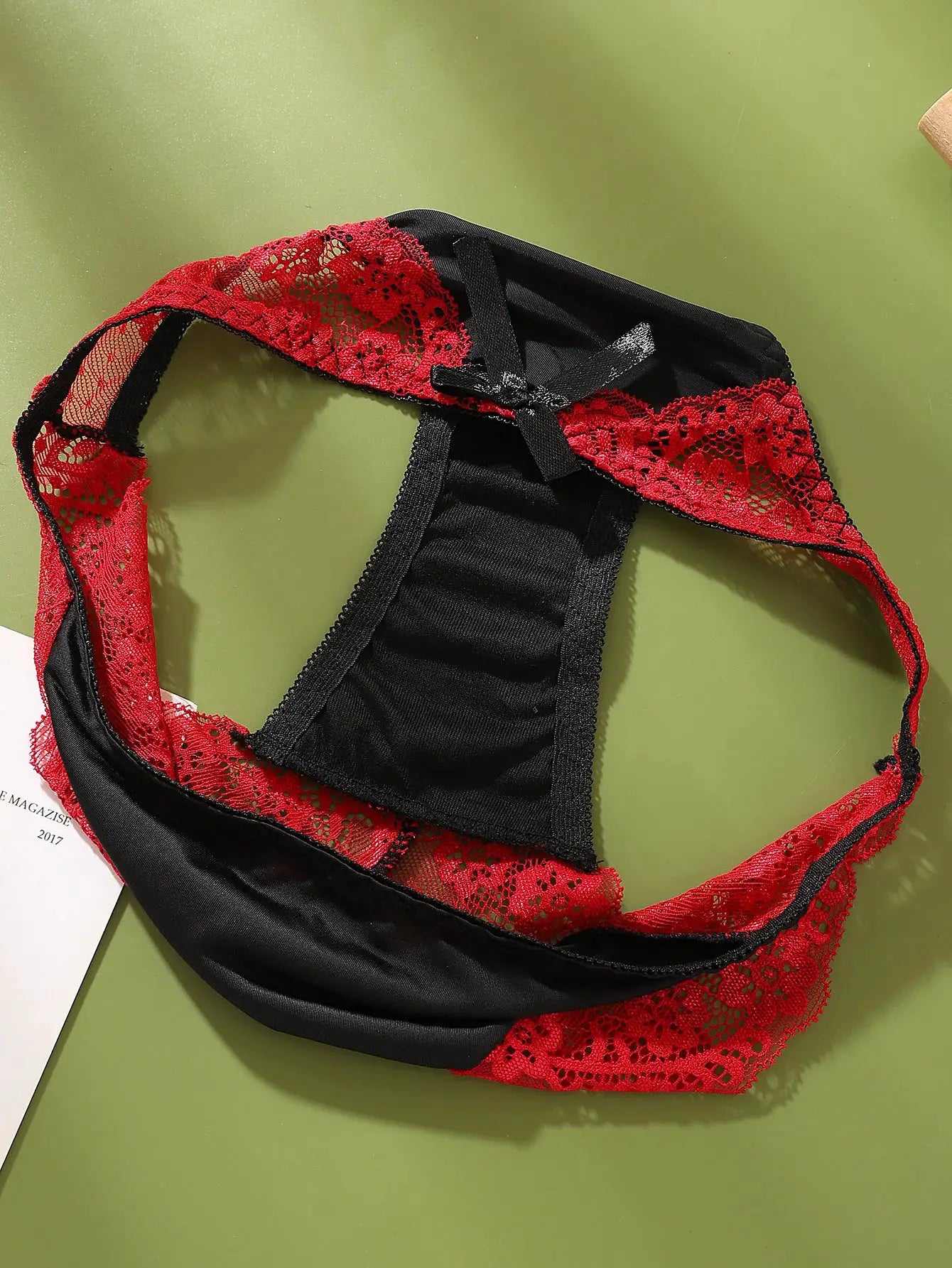 Color-block lace briefs in black with red floral lace trim, mid-low rise