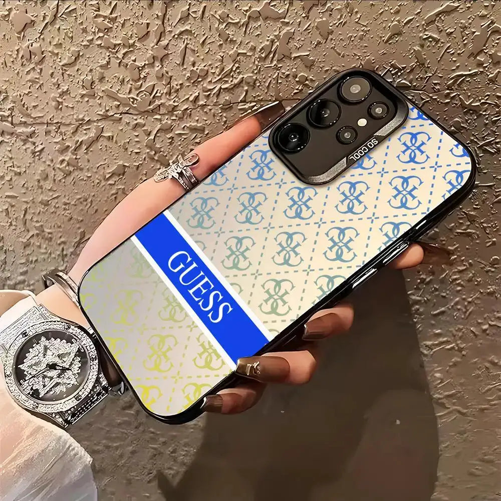Guesses What phone case for Samsung Galaxy S26–S20 series with colorful silver GUESS logo pattern and blue stripe