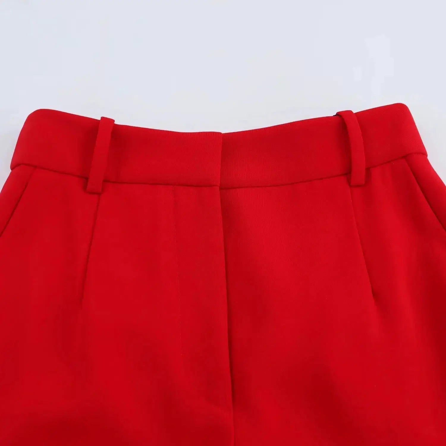 Red high-waisted wide-leg pants with belt loops and front seam detail
