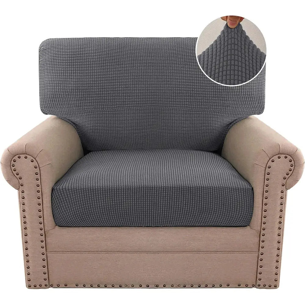 Jacquard polar fleece stretch sofa cover on a beige upholstered armchair; dark gray textured seat and back protector