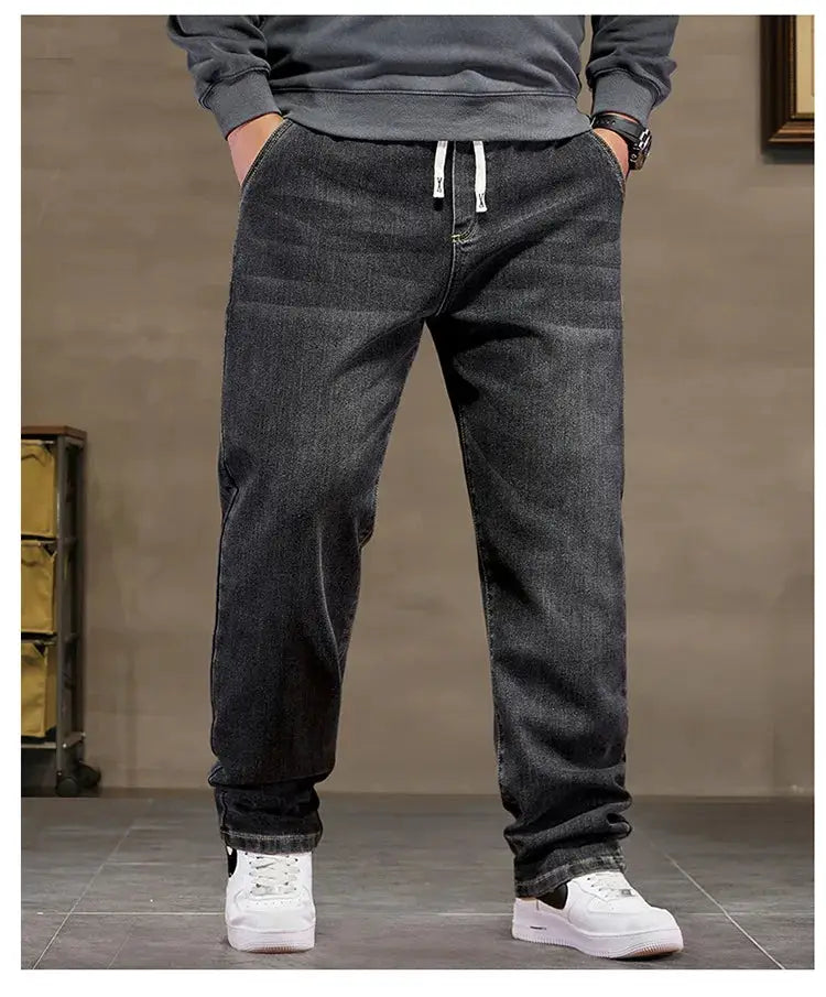 Men's extra-big black baggy denim jeans with high-elastic waist and drawstring