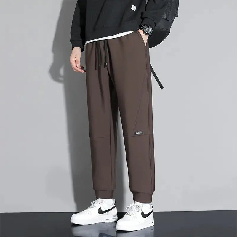Simples Market 10XL casual men's brown jogger pants with elastic waist and drawstring, cuffed ankles.