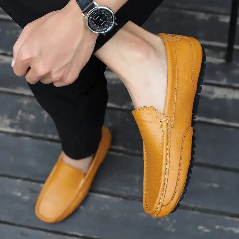 Men's tan genuine leather loafers slip-on driving moccasins with stitched detailing and rubber lug sole