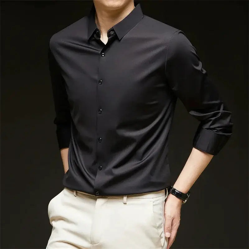 Men's black solid business-casual long-sleeve shirt with wrinkle-resistant fabric.