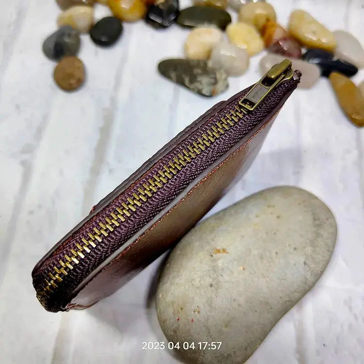 Mini zipper waist bag by Simples Market; brown leather belt-pack with gold-tone zipper