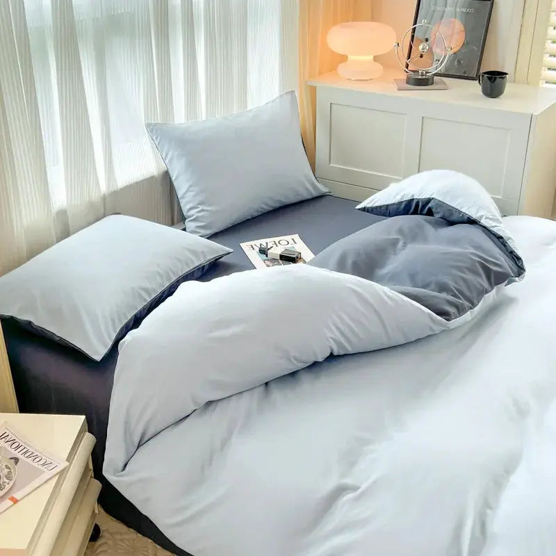 4-piece brush-fabric duvet cover bedding set in light blue with matching pillowcases on a bed
