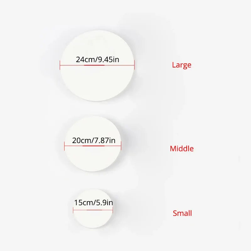 Three white aluminum LED wall lamp discs in sizes large 24 cm, middle 20 cm, small 15 cm