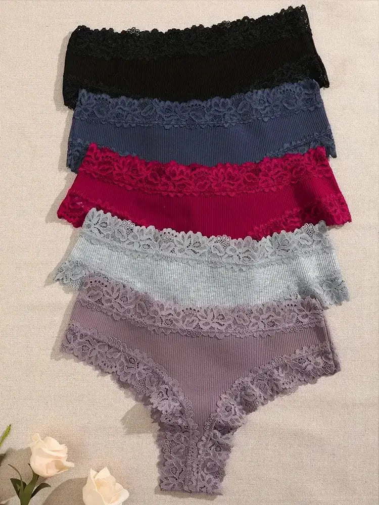 Set of seven women's cotton lace panties in assorted colors with floral lace trim.