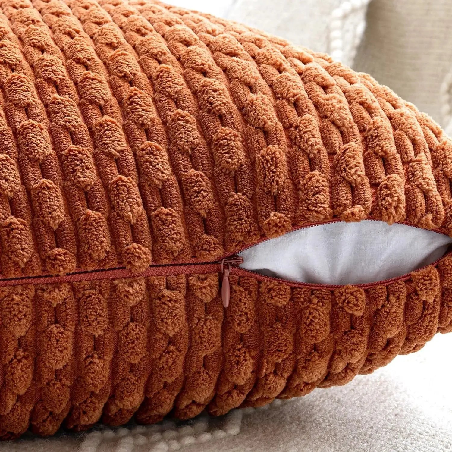 Simples Market orange corduroy pillow cover with chunky striped texture and zipper, 20x20 in.