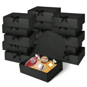 Simples Market black gift box set with lids and ribbons; open box shows perfume bottle and small gifts