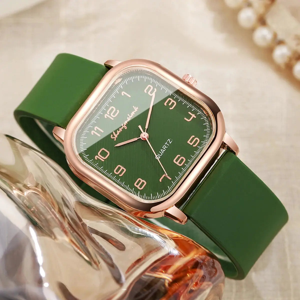 Square women’s quartz watch by Simples Market with green dial, rose-gold case and green silicone strap