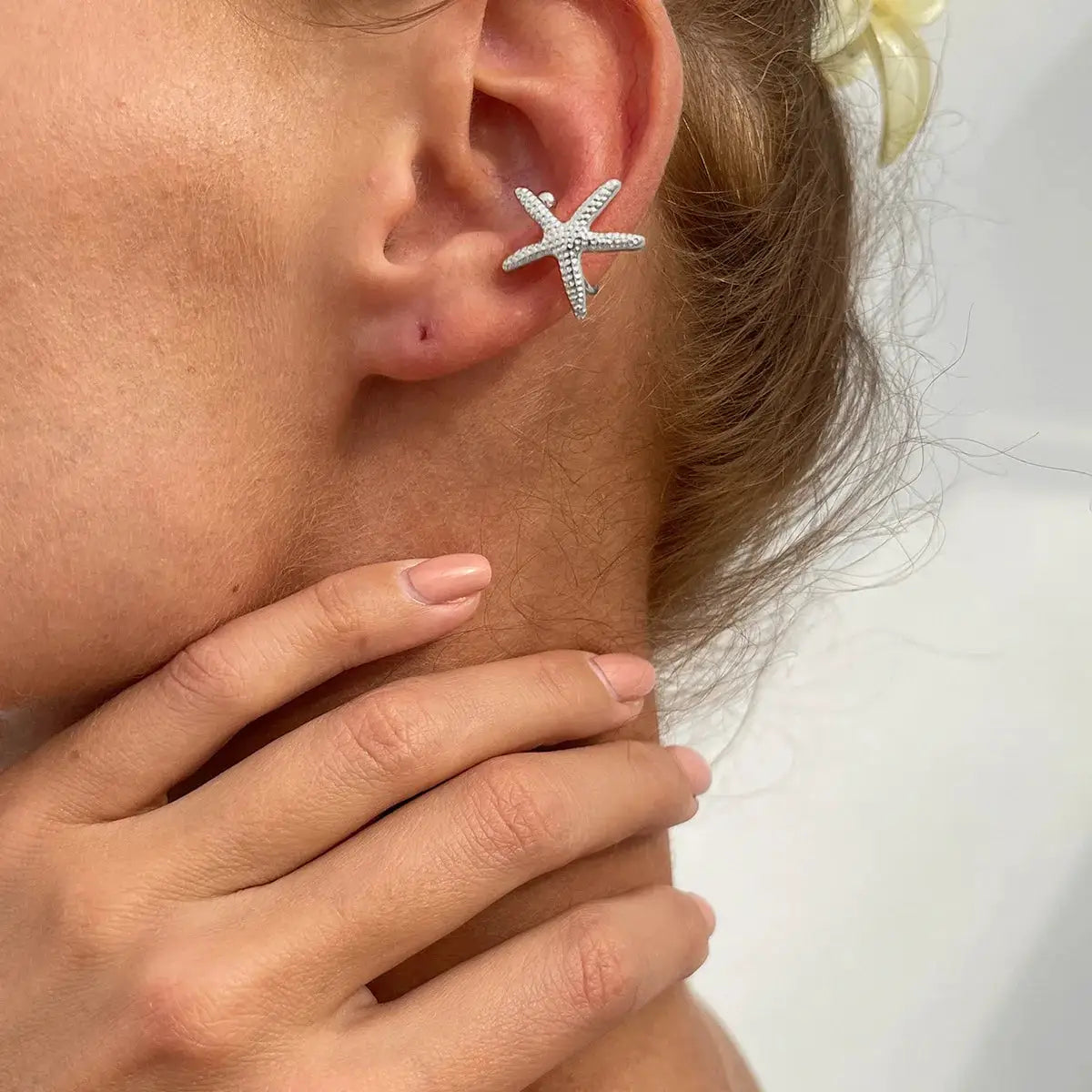 Starfish ear clip earring in silver textured metal for women, boho beach party jewelry