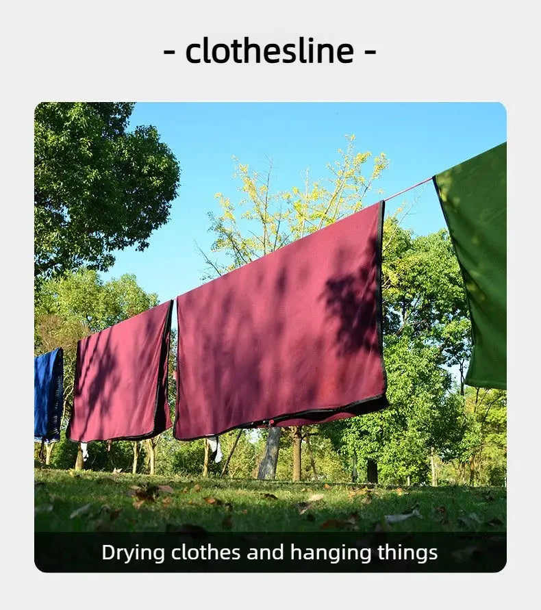 Clothesline with colorful towels hanging in a sunny park