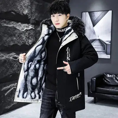 Winter men's long black down jacket with fur-trimmed hood by Simples Market.