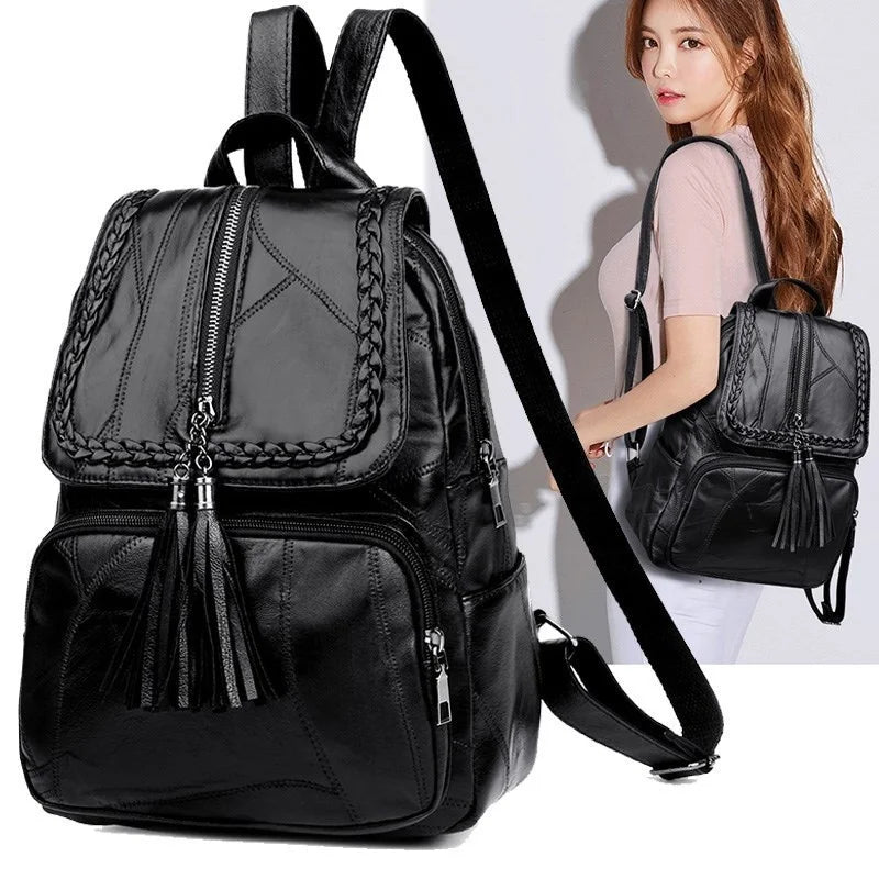 Mini men's black faux leather backpack with braided trim and tassel zippers