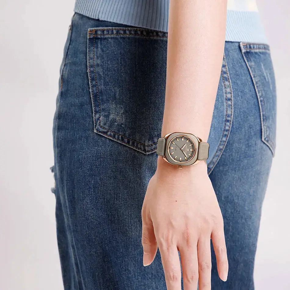 NAVIFORCE women's silicone watch with grey dial, grey strap, and gold-tone case