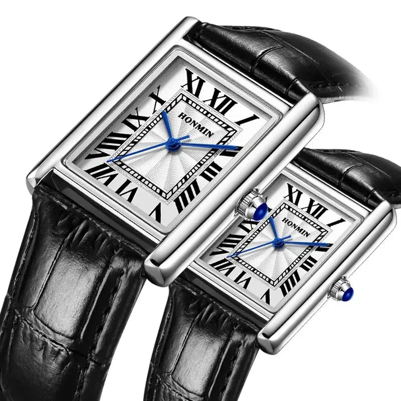 Pair of rectangular watches with black leather straps, silver cases, white Roman numeral dials and blue hands; HONMIN