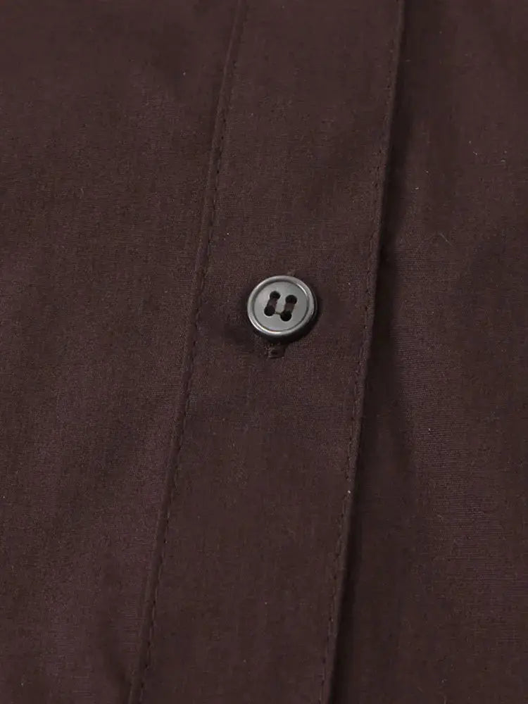 NLZGMSJ women's shirt in dark brown fabric with front button detail.