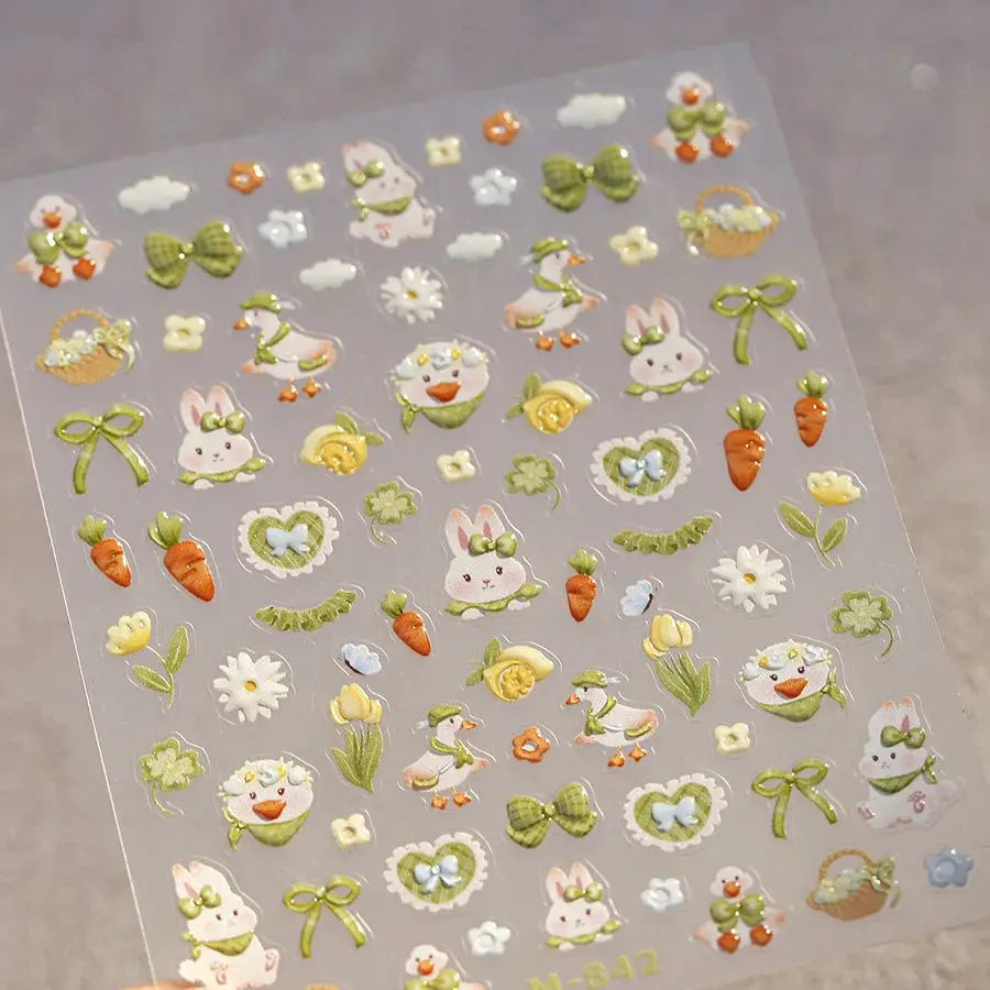 Nail art stickers sheet with pink translucent jelly texture; 5D embossed self-adhesive decals of cute fruits and bunnies