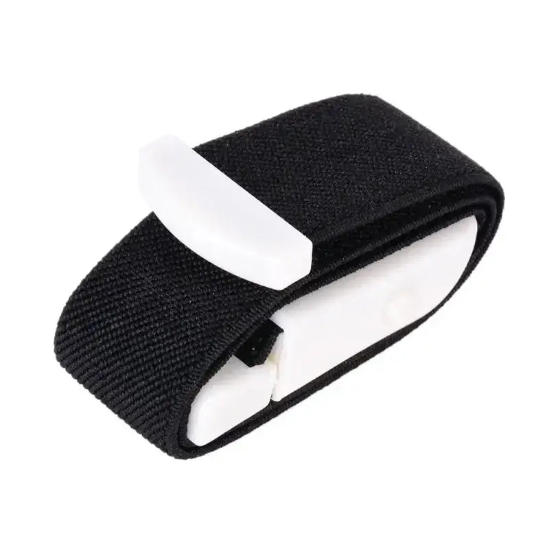 Emergency tourniquet by Simples Market; black nylon strap with white plastic buckle