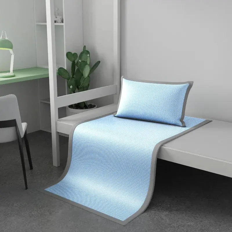 Simples Market 2-piece blue ice silk sleeping mat and pillow on dorm bed