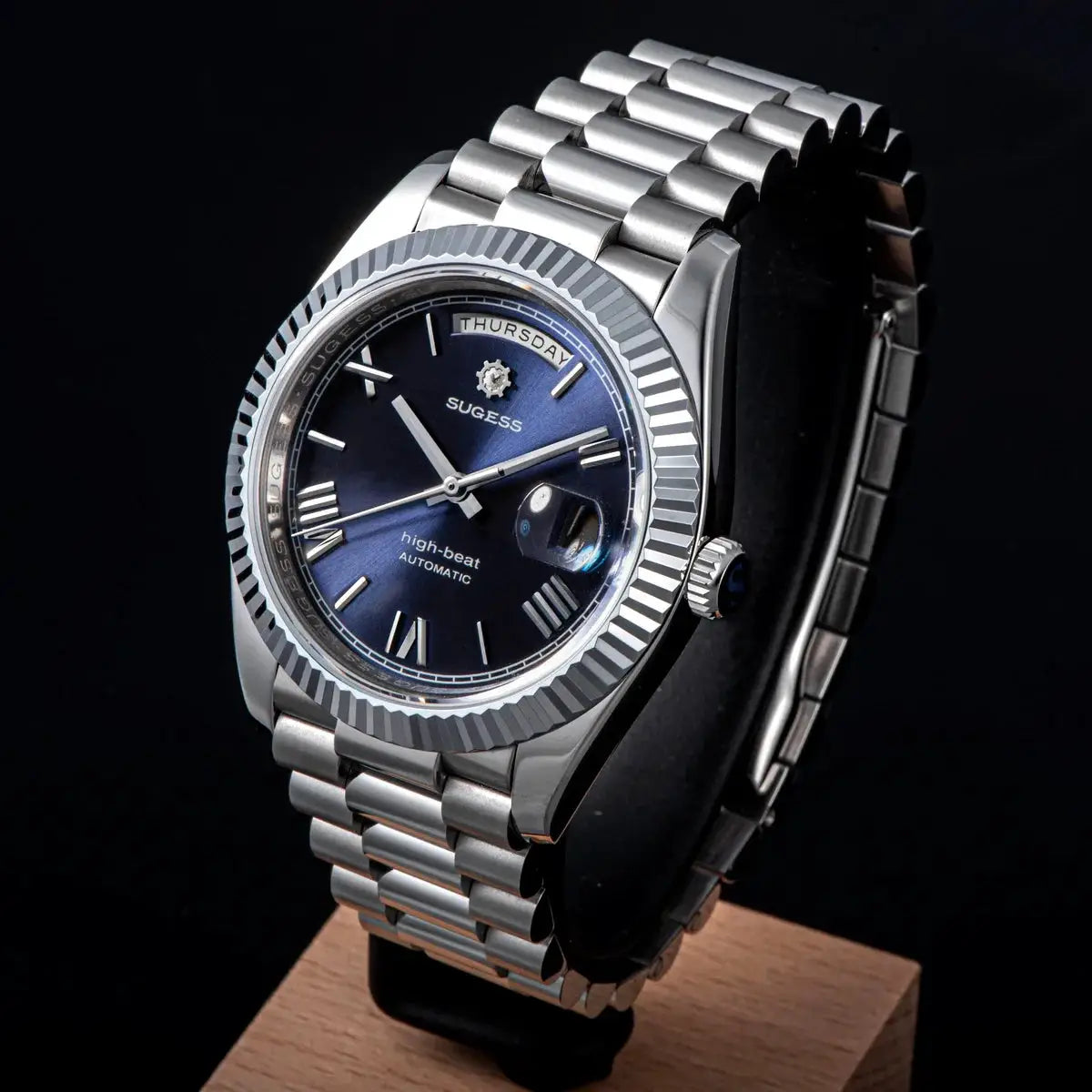 Sugess men's 40mm stainless steel automatic watch with blue dial, day/date, fluted bezel, sapphire glass