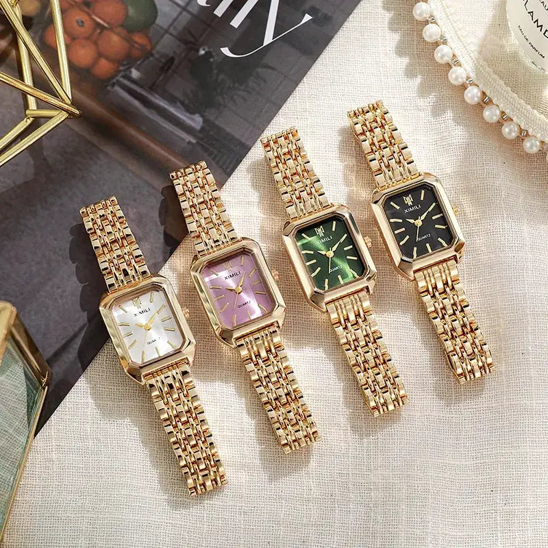 Luxury women's rectangle watches with gold-tone steel bands; four quartz dials in white, lavender, green, and black
