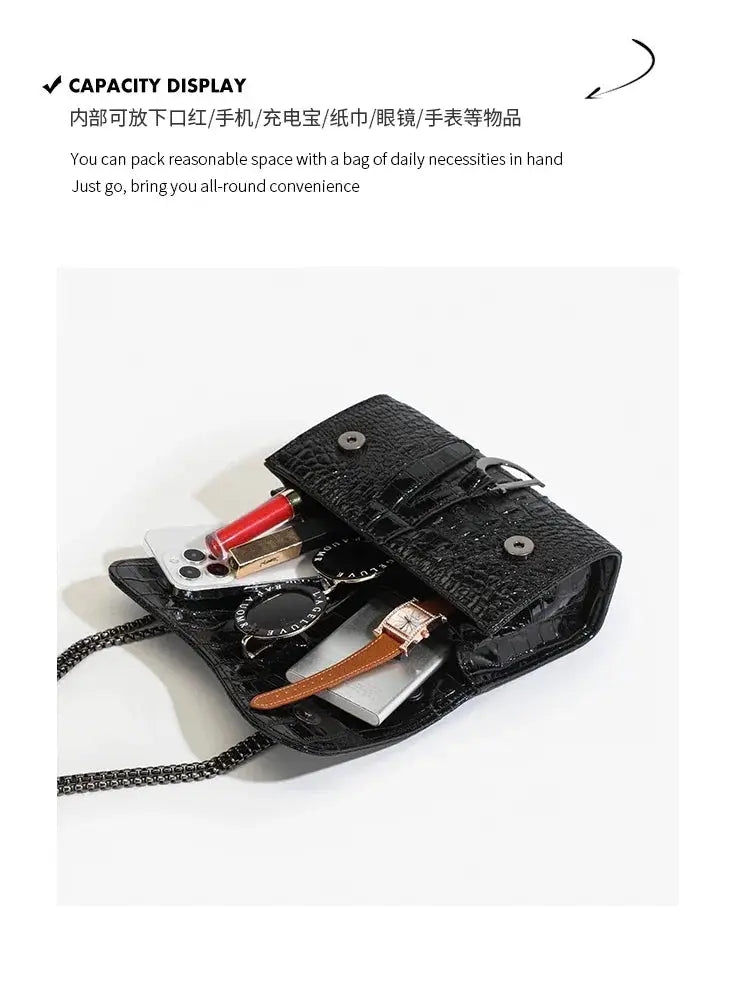Women's black crocodile-textured crossbody handbag by Simples Market with chain strap