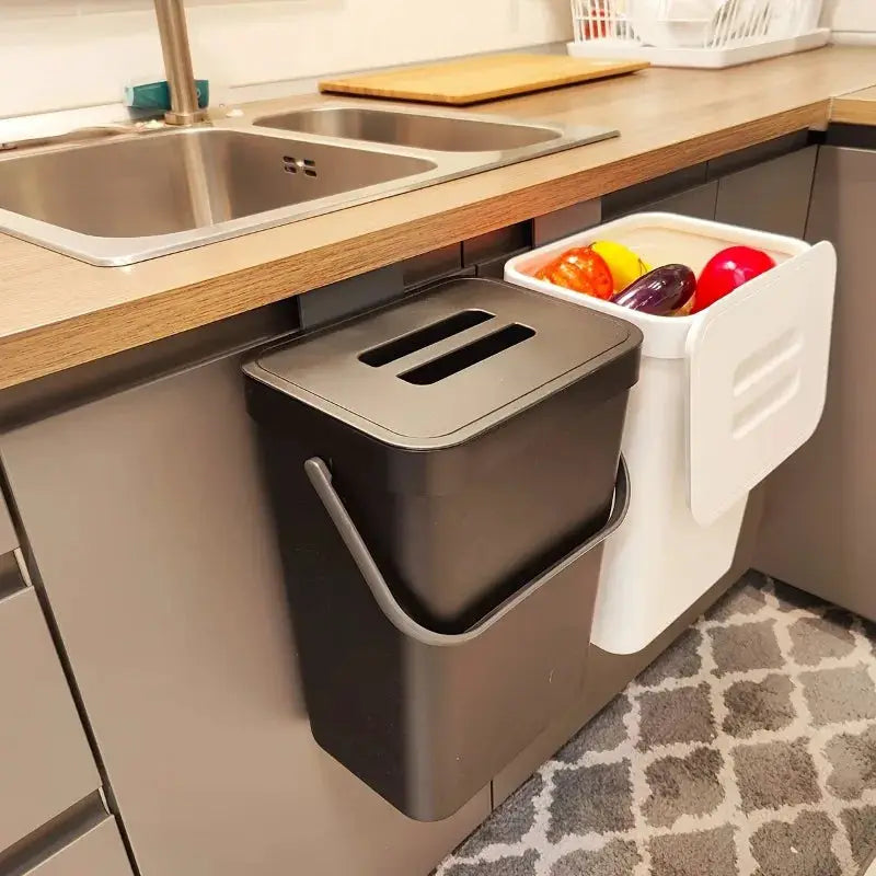 Simples Market space-saving trash can set (2) in black and white with quiet-close lids under a kitchen counter