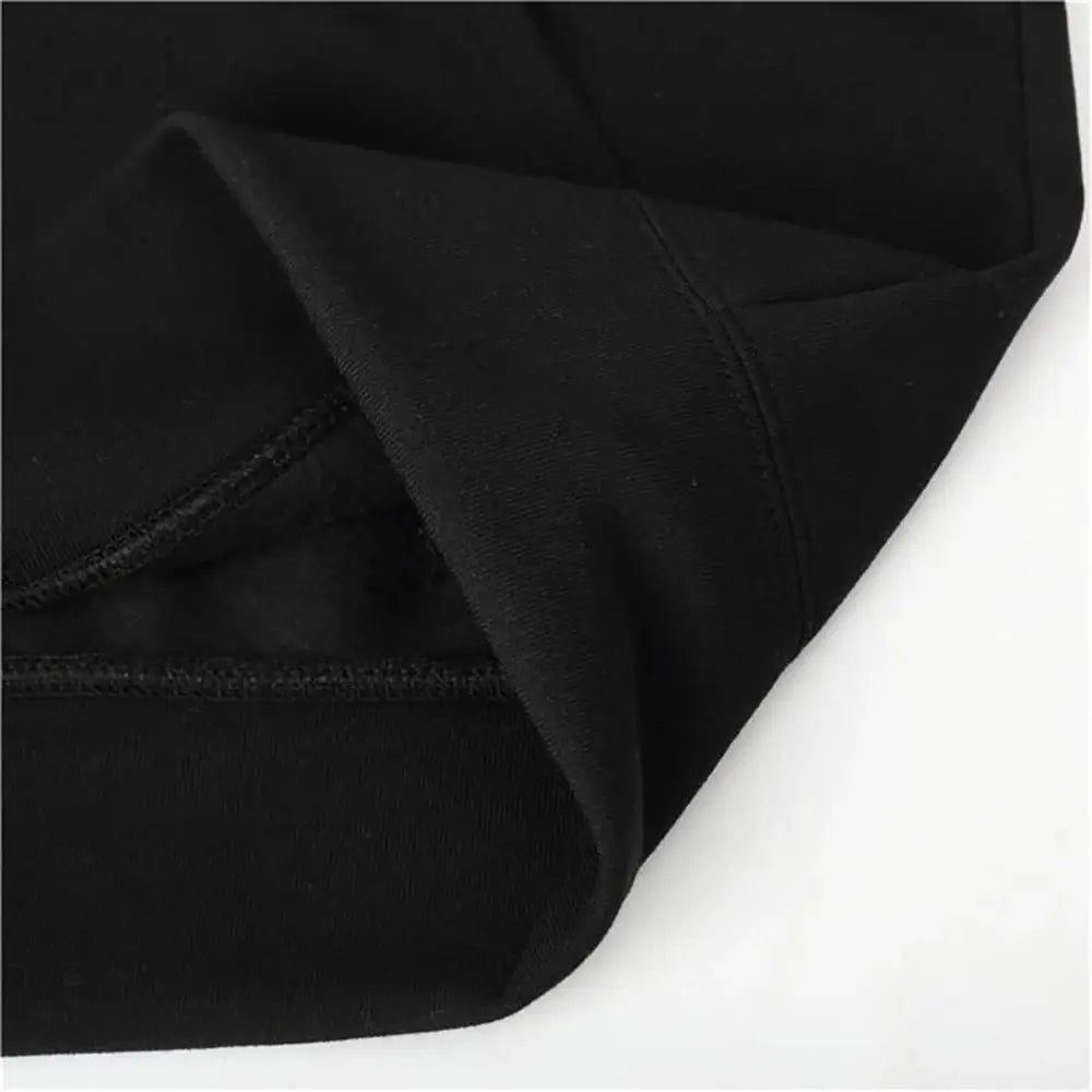 Zip hoodie by Simples Market; black sleeve close-up with ribbed cuff and visible stitching.