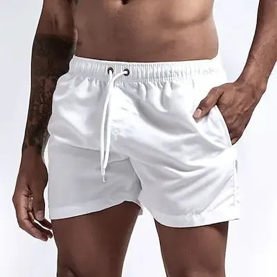 Men's white swim shorts with drawstring, quick-dry fabric and side pockets