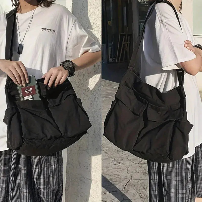 Women's black canvas school messenger bag with large capacity and front pockets