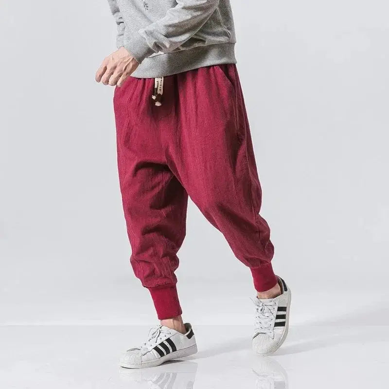 Men's burgundy baggy cotton-linen harem joggers with drop-crotch and cuffed ankles