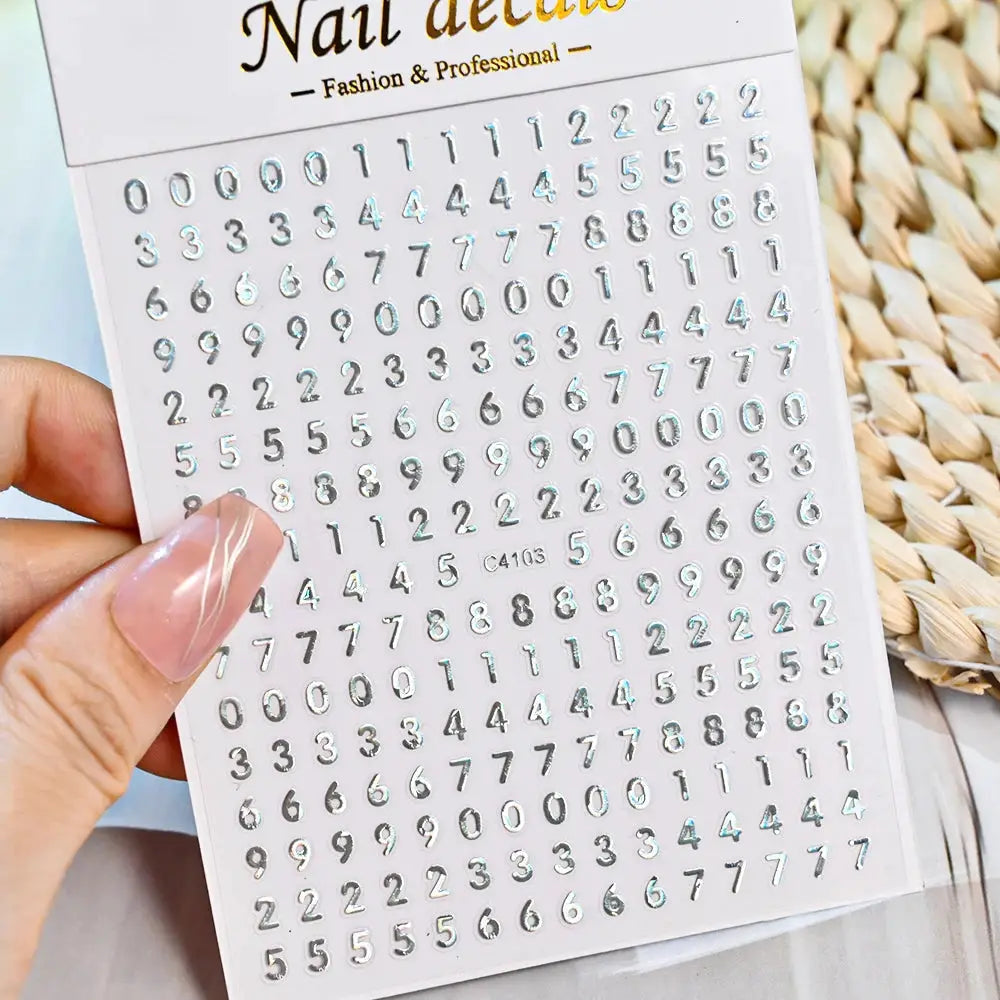 Nail decal sheet with metallic silver Roman letters and numbers; self-adhesive manicure stickers