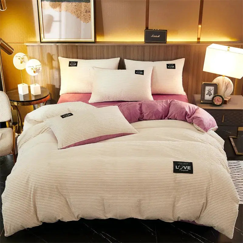 3pc duvet cover bedding set with cream striped cover and pink coral fleece lining; includes two pillowcases.