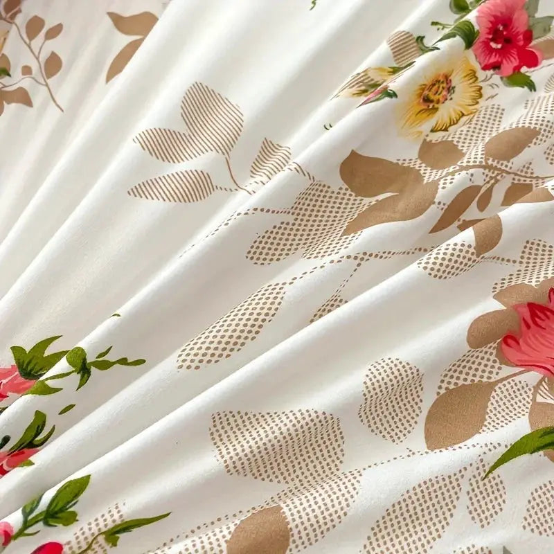 Floral duvet cover set by Simples Market on white fabric with beige botanical print; includes duvet cover and two pillowcases