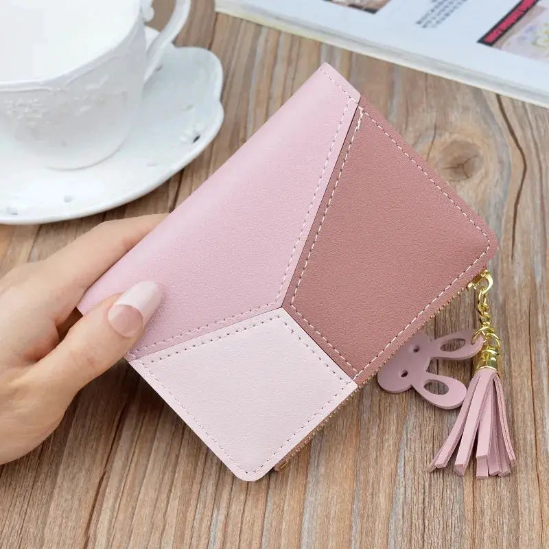 Simples Market PU leather wallet with geometric pastel pink color-block panels and tassel charm