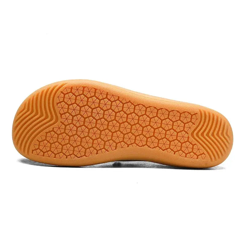 Barefoot shoes sole in orange with honeycomb tread pattern