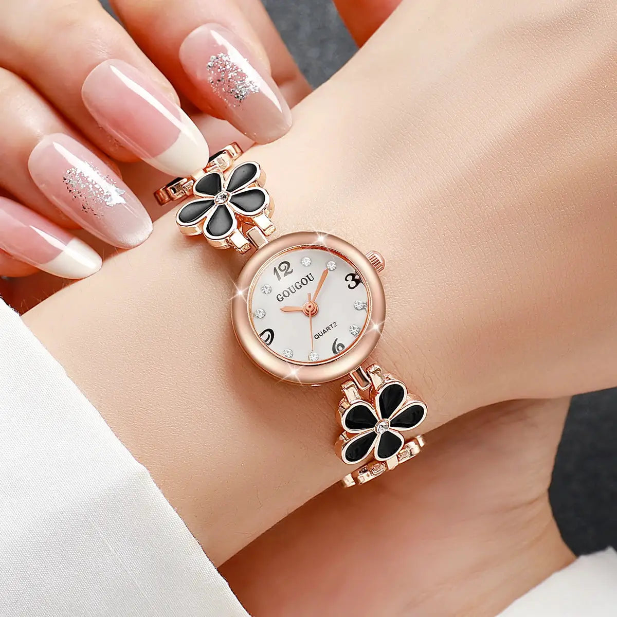 Simples Market rose-gold women's watch with flower bracelet, black enamel petals and crystal accents, quartz