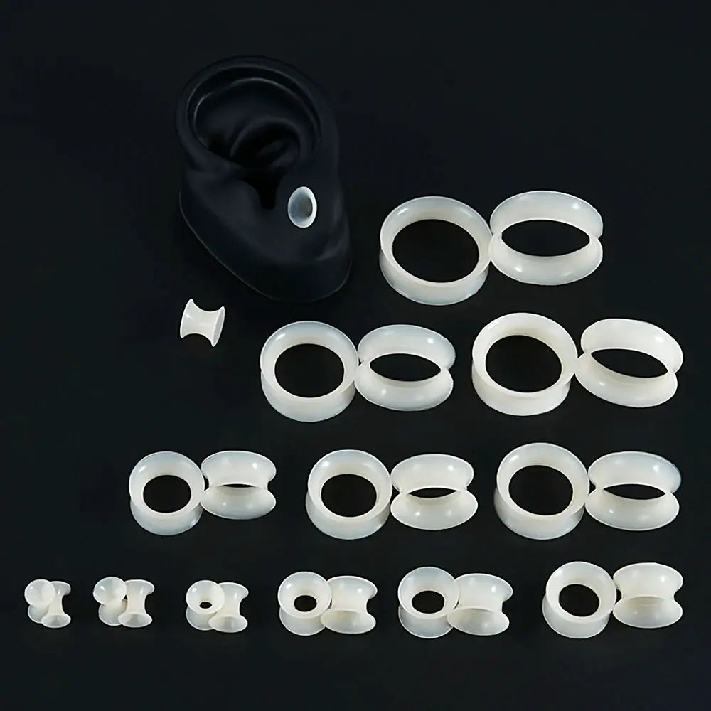 Ear tunnels set of assorted sizes in white silicone; double-flare design, by Simples Market