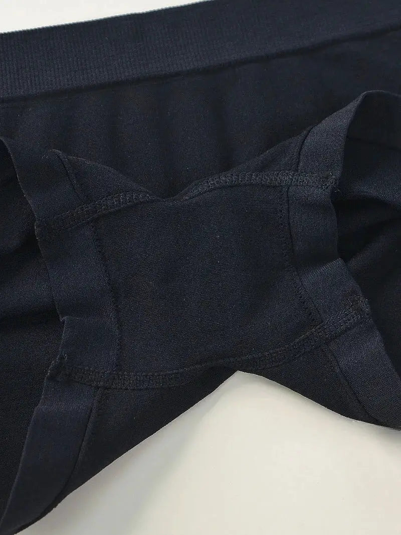 Seamless sports underpants by Simples Market, black; snug fit, waistband stitching detail.