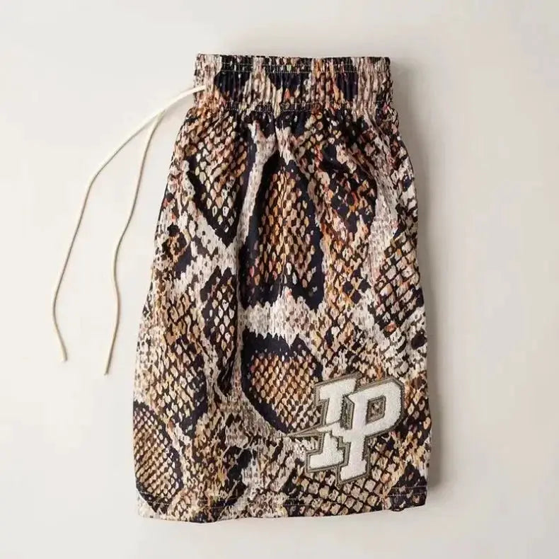Men's snake-print shorts with IP logo patch