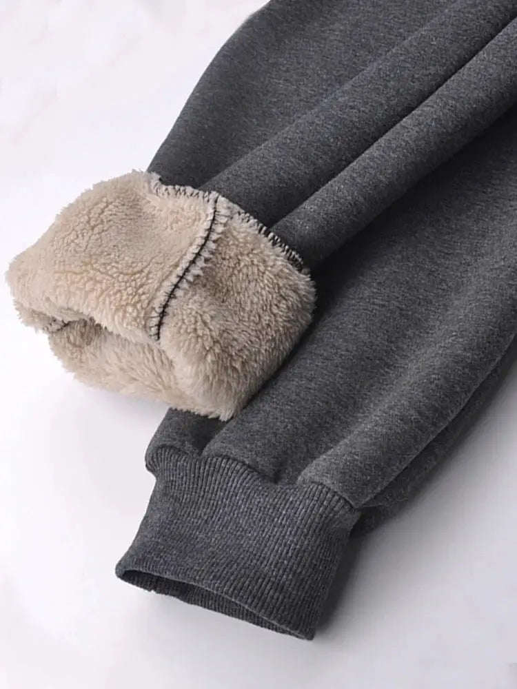 Men's winter thick fleece sweatpants in dark gray with beige sherpa lining at cuffs