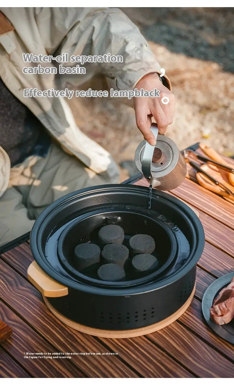 Naturehike tabletop charcoal stove with round black pot and charcoal briquettes for camping
