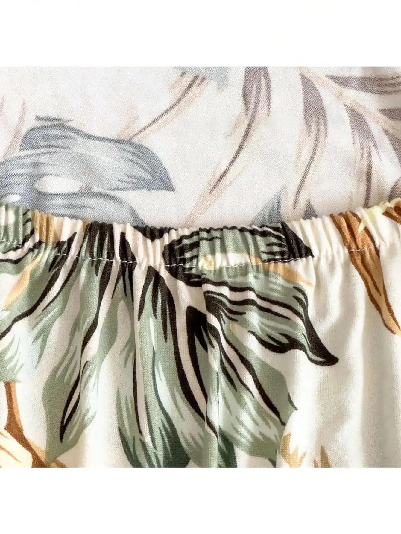 Outdoor tropical print sofa cushion cover with elasticized edge, non-slip protector
