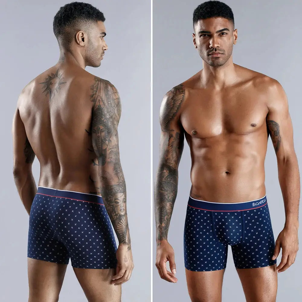 Simples Market cotton print men's boxer shorts in navy with white pattern and red waistband.