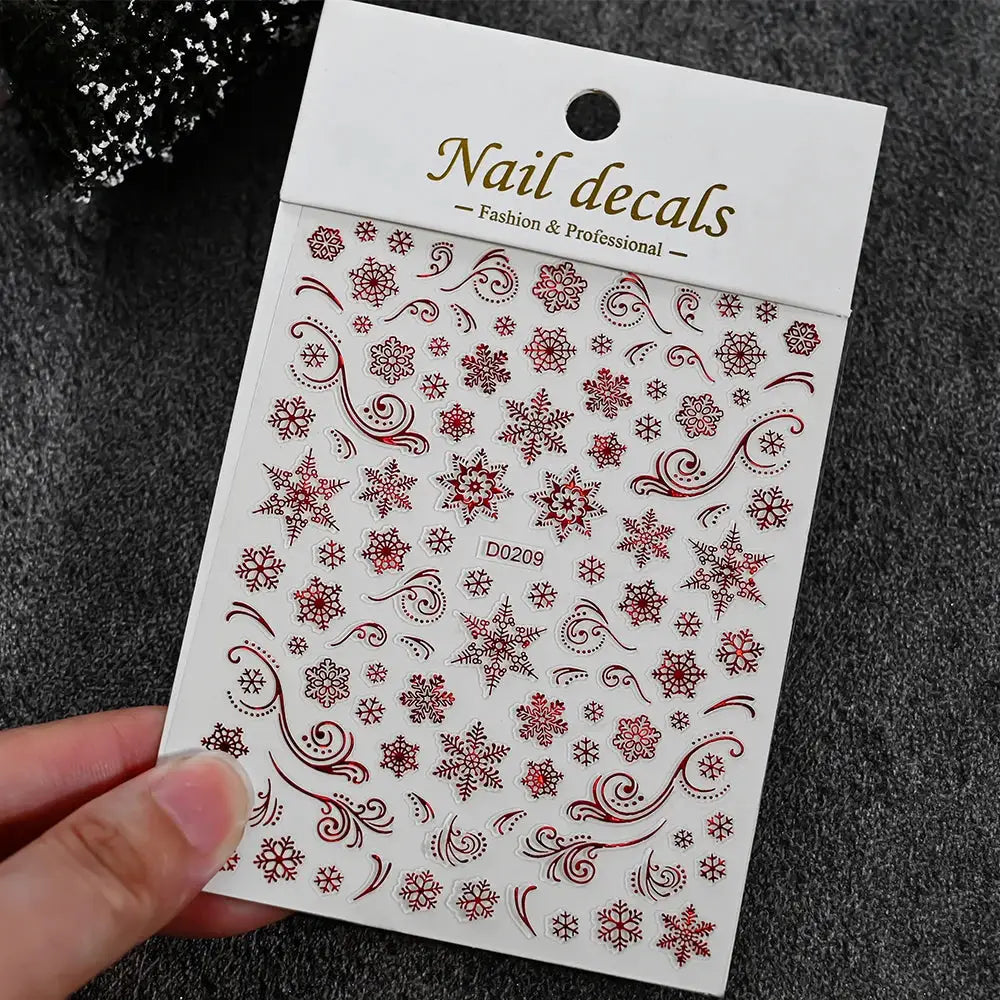 Winter Christmas nail decals sheet with red snowflakes and swirls, self-adhesive nail art
