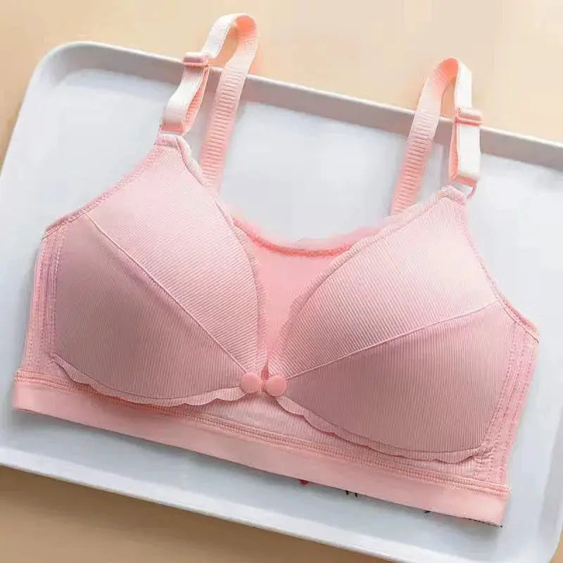 Pink wireless push-up bra by Simples Market with padded cups and center bow