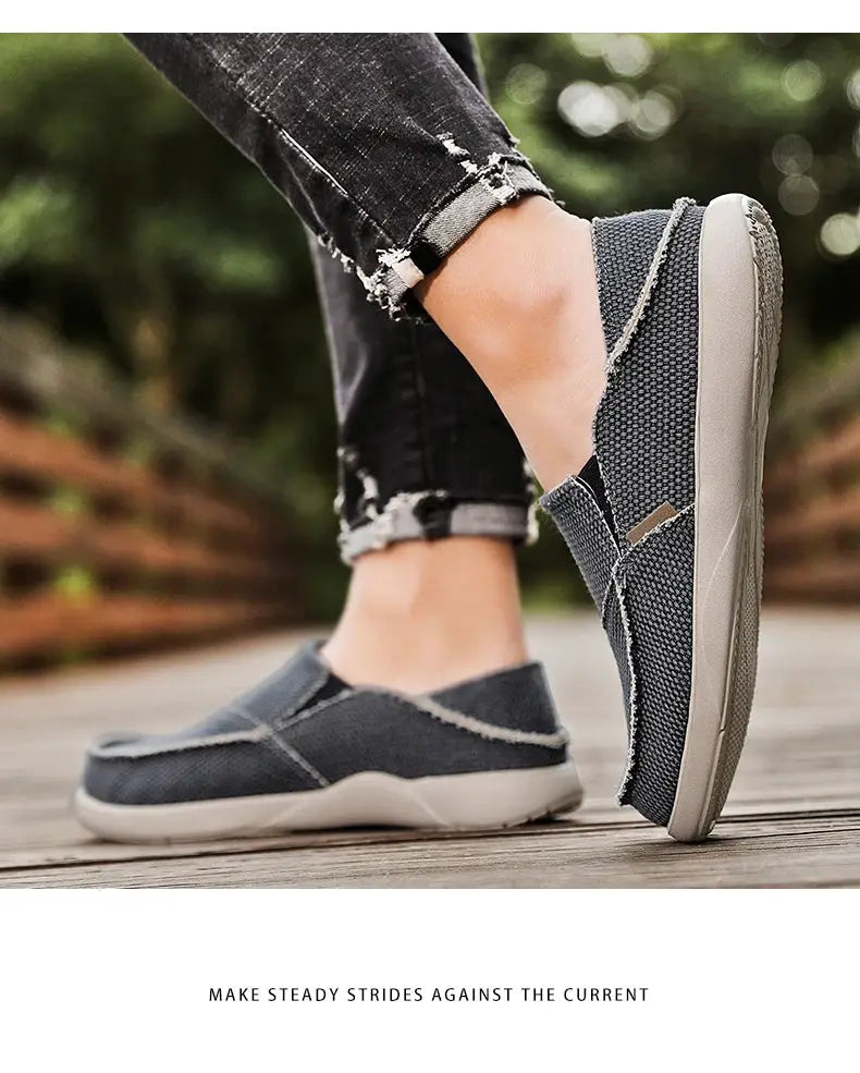Simples Market pair of men's dark gray-blue canvas slip-on loafers with light soles